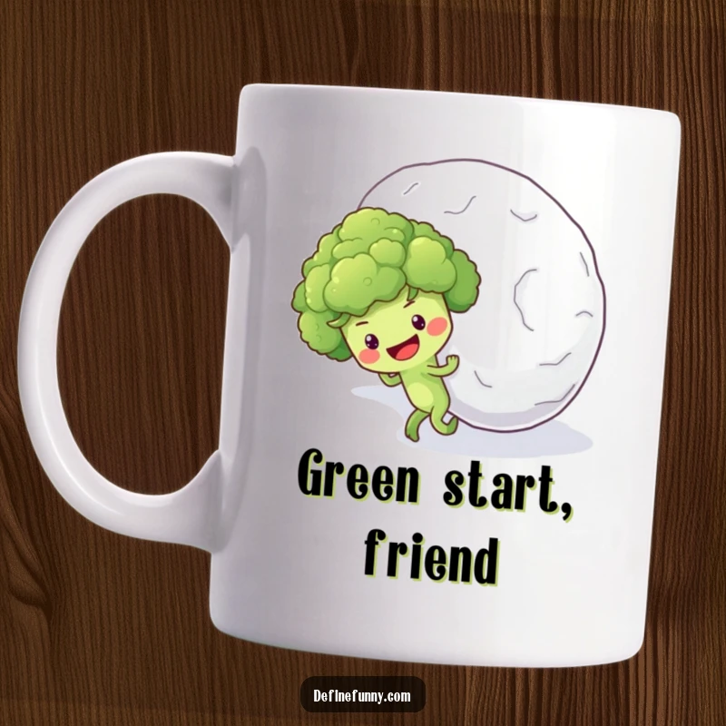 Funny mug showing an optimistic broccoli floret character straining to push a massive snowball uphill, a comical struggle.