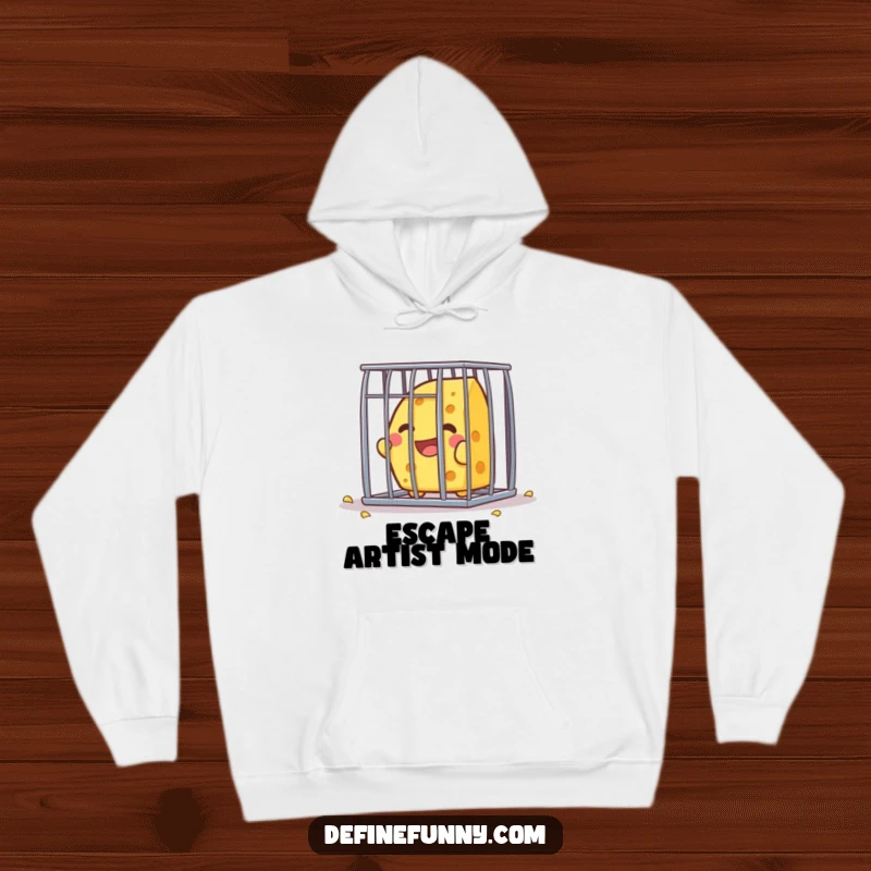 Funny Kawaii cheese character, joyfully escaping a small cage, featured on a warm and humorous hoodie.
