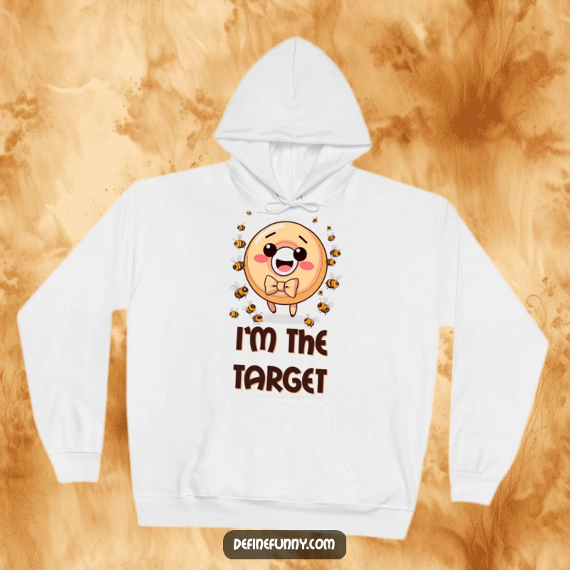 Funny donut character chased by furious bees, featured on a cozy hoodie, ideal for humor enthusiasts.
